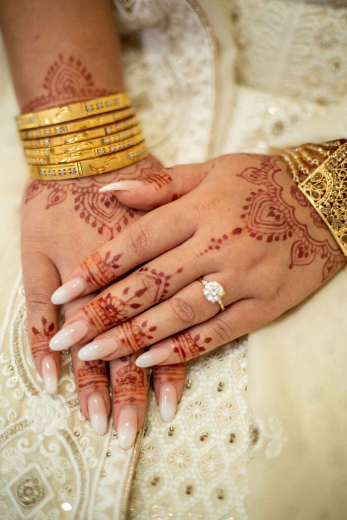 Brooklyn Nikkah Elopement. Close up of bride's full jewelry and henna before the ceremony.
