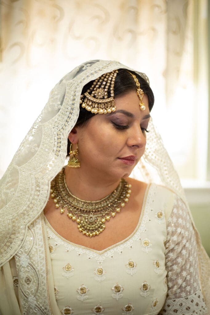 Brooklyn Nikkah Elopement. Portrait of bride with full jewelry and henna before the ceremony.