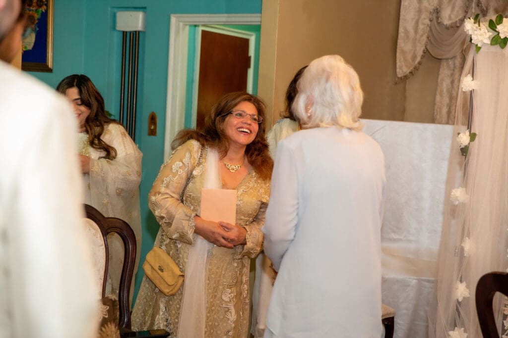 Brooklyn Nikkah Elopement. Family greeting guests to ceremony.