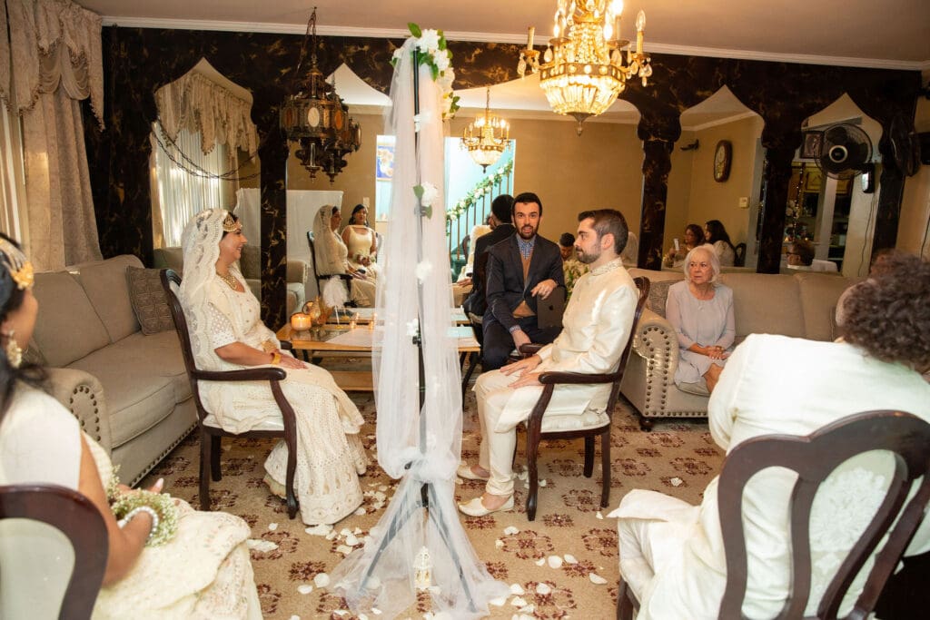 Brooklyn Nikkah Elopement. Side view of the groom and bride looking at the partition.