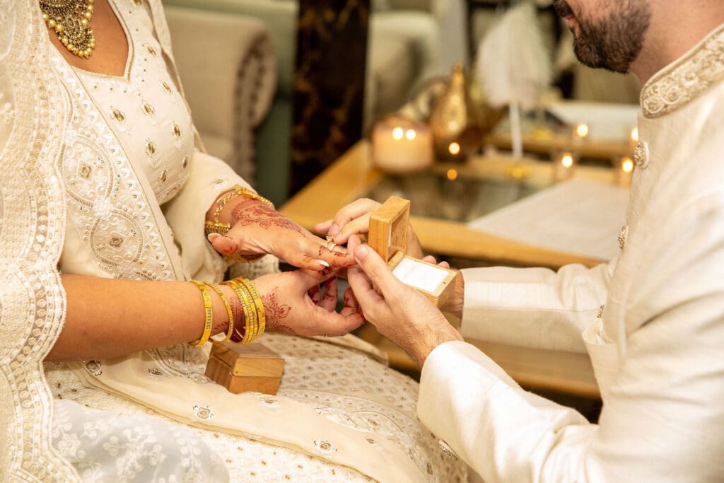Brooklyn Nikkah Elopement with Imam leading ceremony and close up of ring exchange.