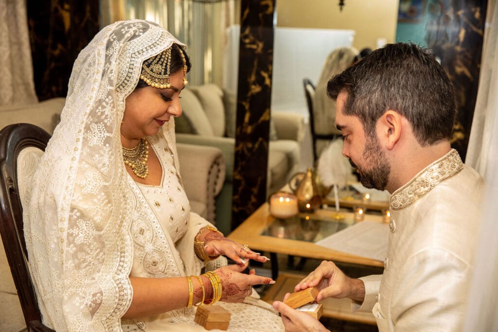 Brooklyn Nikkah Elopement with Imam leading ceremony and close up of ring exchange.