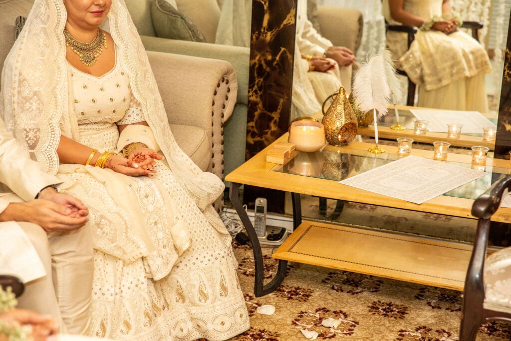 Brooklyn Nikkah Elopement with Imam leading ceremony and close up of praying hands.