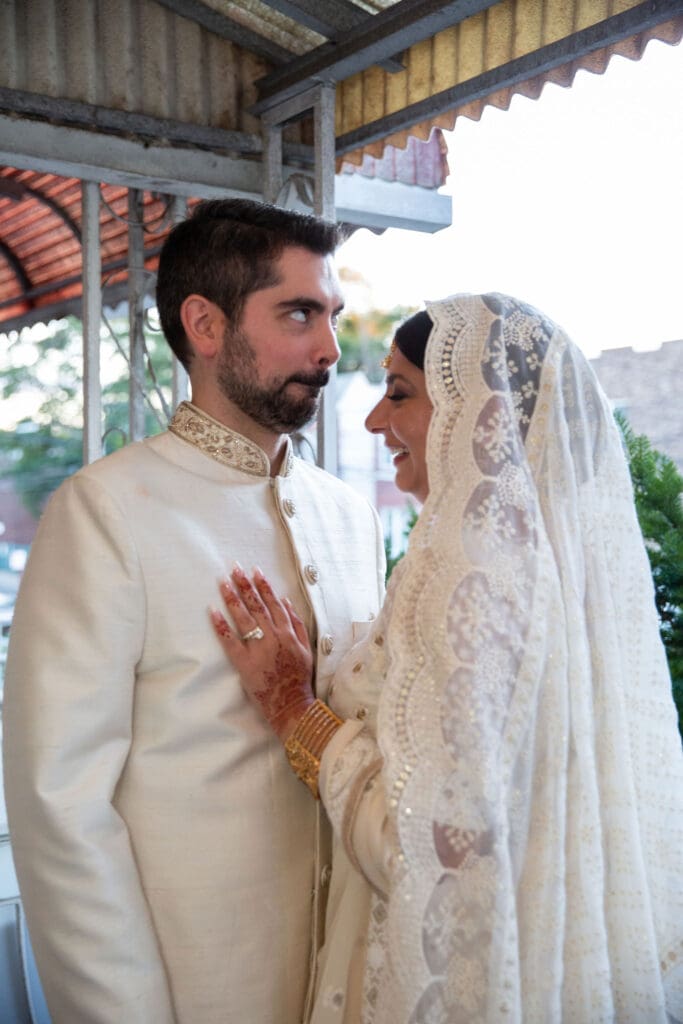Brooklyn Nikkah Elopement with newlyweds posing for a portrait and groom making a silly face.