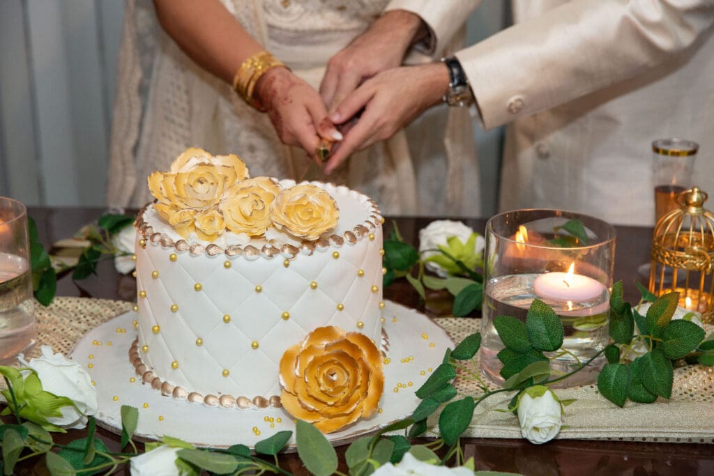 Brooklyn Nikkah Elopement with newlyweds cutting their cake.