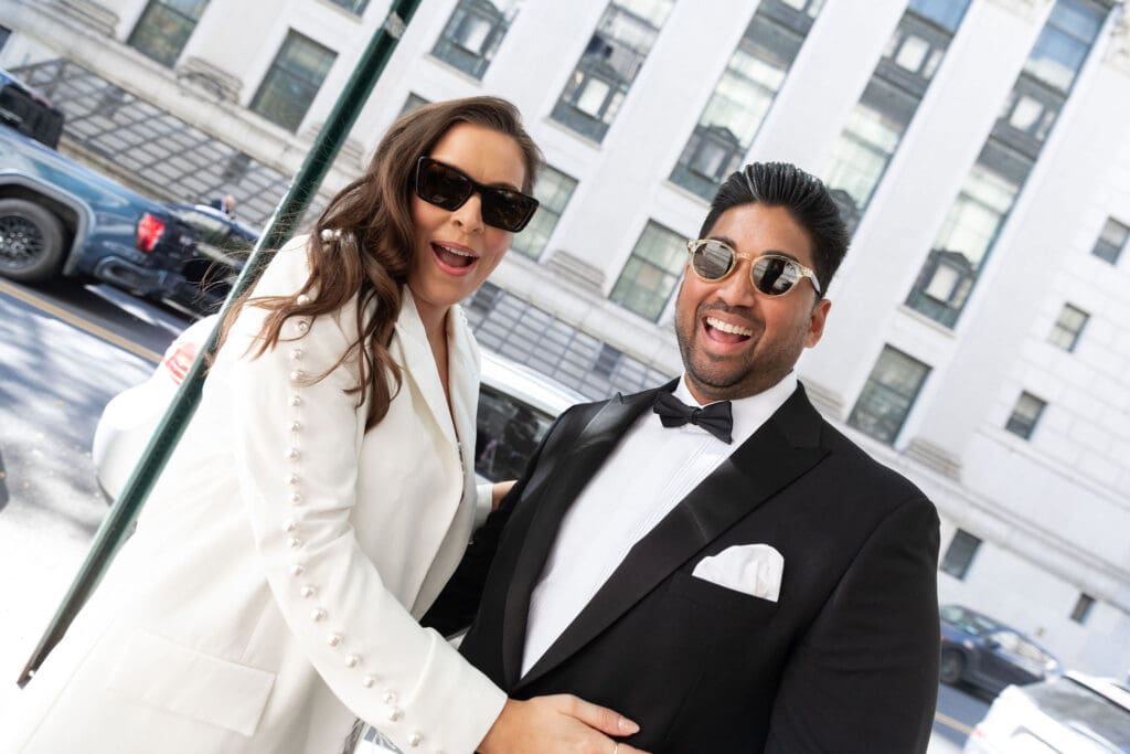 Newlywed couple celebrate after getting married at NYC City Hall.