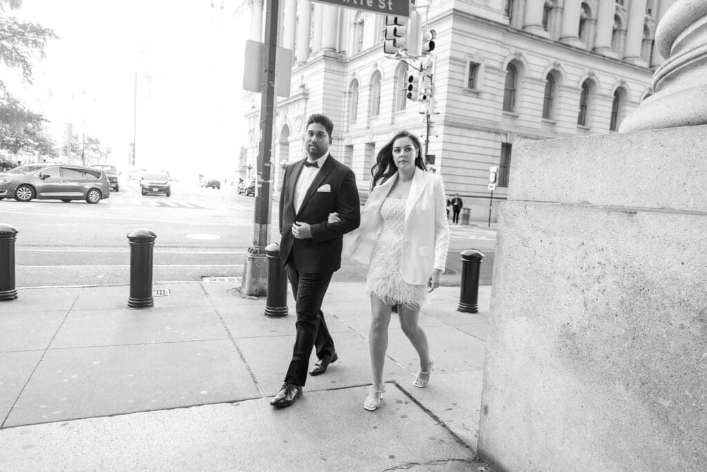Newlywed couple celebrate with wedding portraits in NYC after getting married at City Hall.