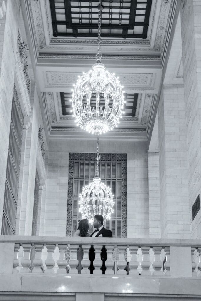 Newlywed UK couple kiss inside Grand Central Station in NYC after getting married at City Hall.