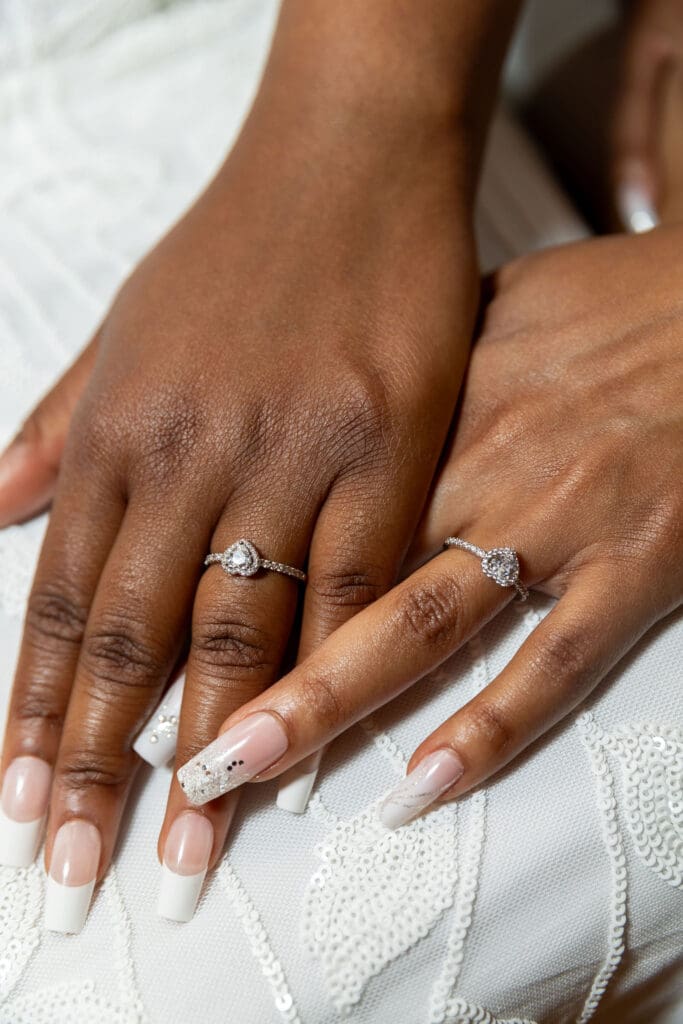 Close up of two brides' hands with rings after getting married at NYC City Hall.