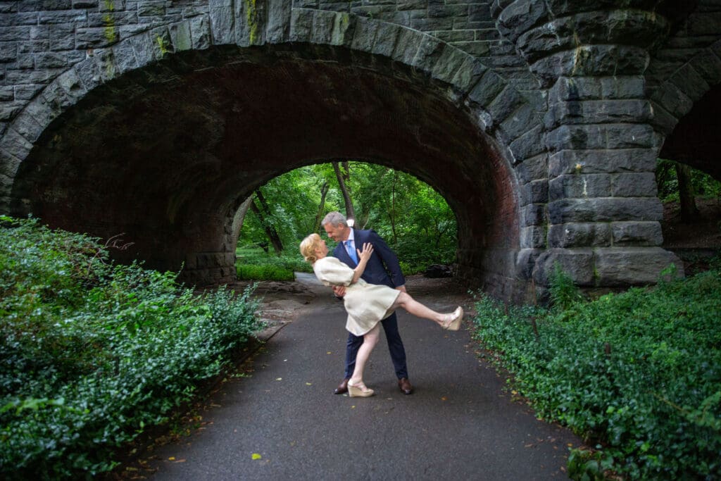 NYC Elopement in Central Park after after ceremony at the Norwegian Seamen's Church. Bride and Groom dance in the park.