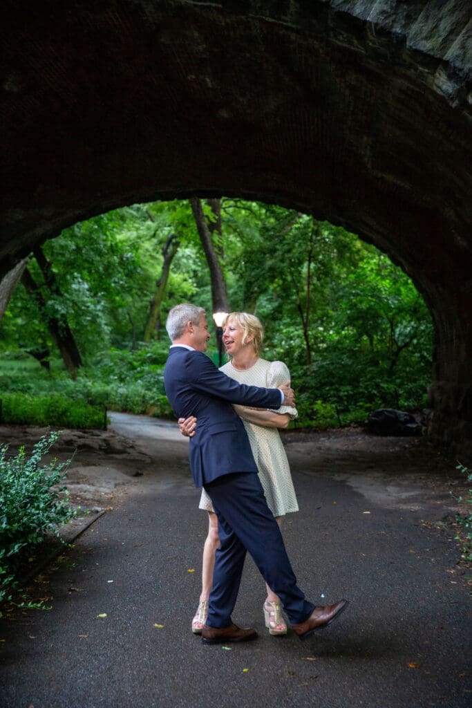 NYC Elopement in Central Park after after ceremony at the Norwegian Seamen's Church. Bride and Groom dance in the park.