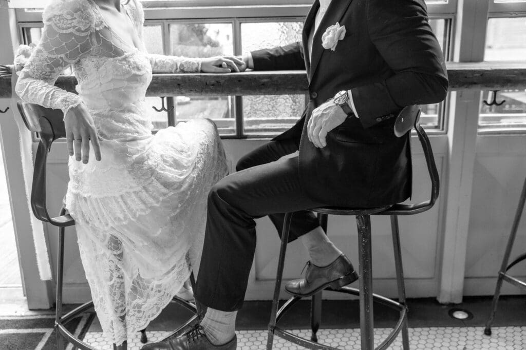 Newlyweds relax at a bar in NYC's Little Italy.