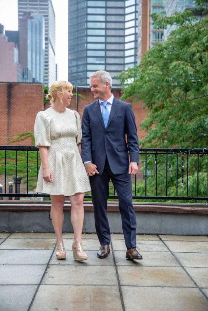 NYC Elopement at the Norwegian Seamen's Church. Bride and Groom celebrate on rooftop after ceremony.