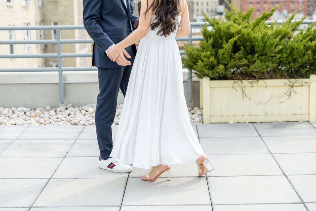 Engaged couple dance on their rooftop on the Upper West Side.