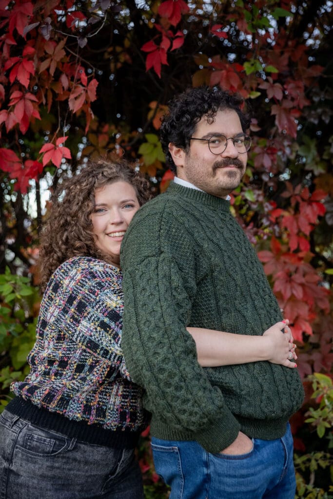 Engaged couple pose at Socrates Sculpture Park in Astoria, Queens for their fall engagement session.