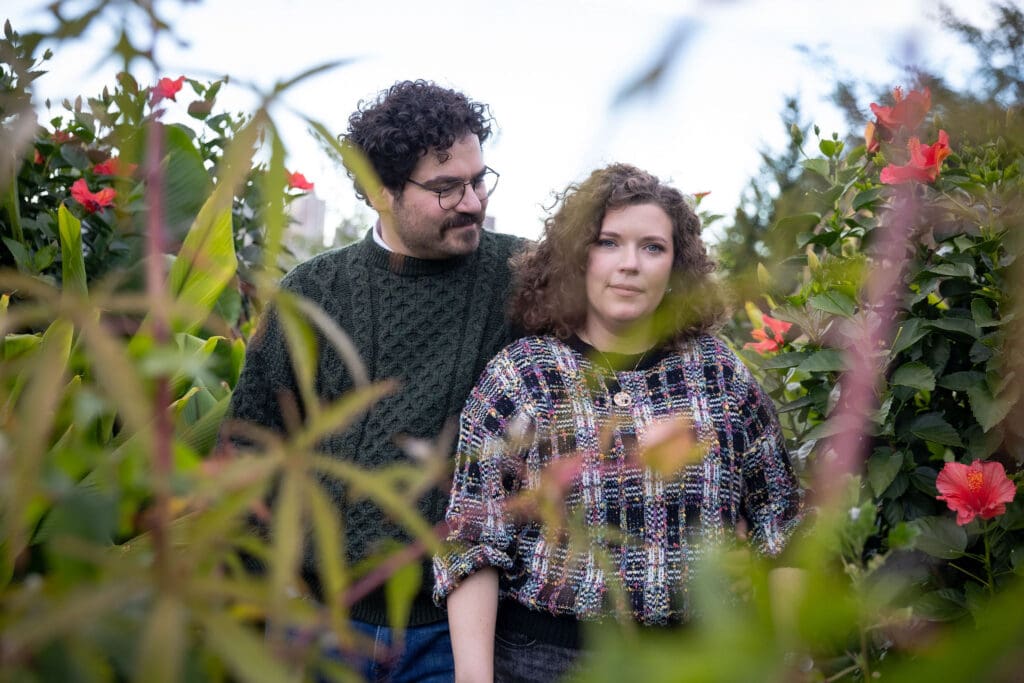 Engaged couple pose at Socrates Sculpture Park in Astoria, Queens for their fall engagement session.